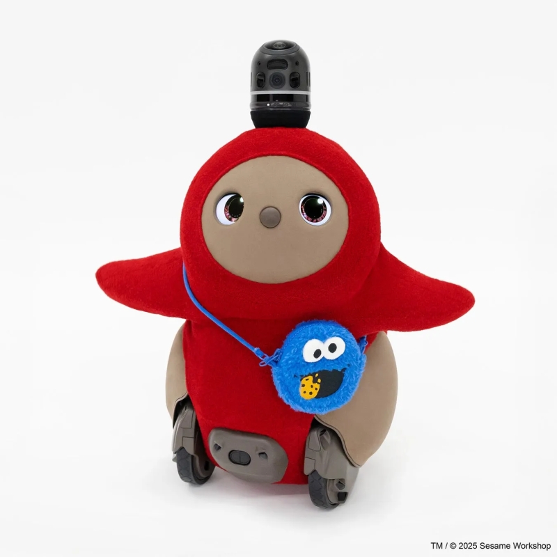 セサミストリートのクッキーモンスターのバッグを持ったロボット