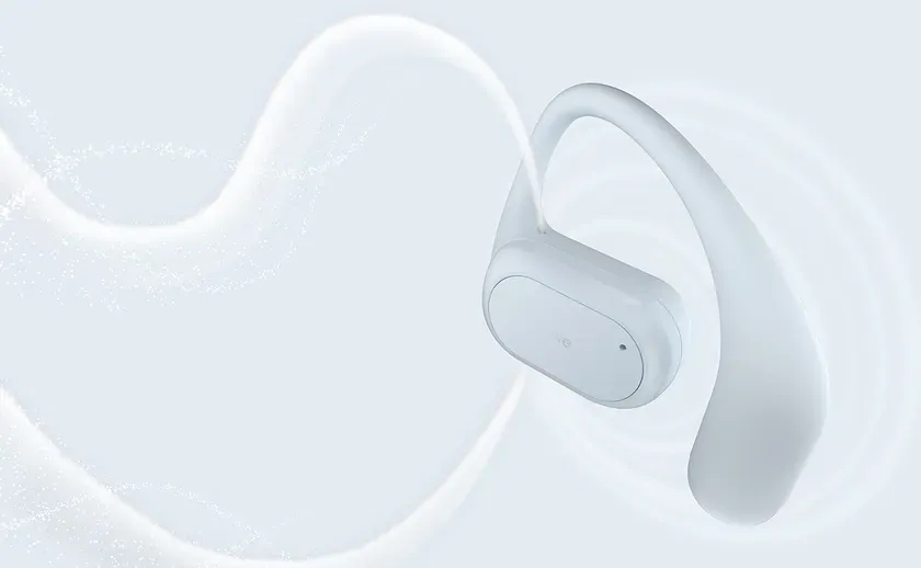 白いイヤホンと抽象的な背景の画像。